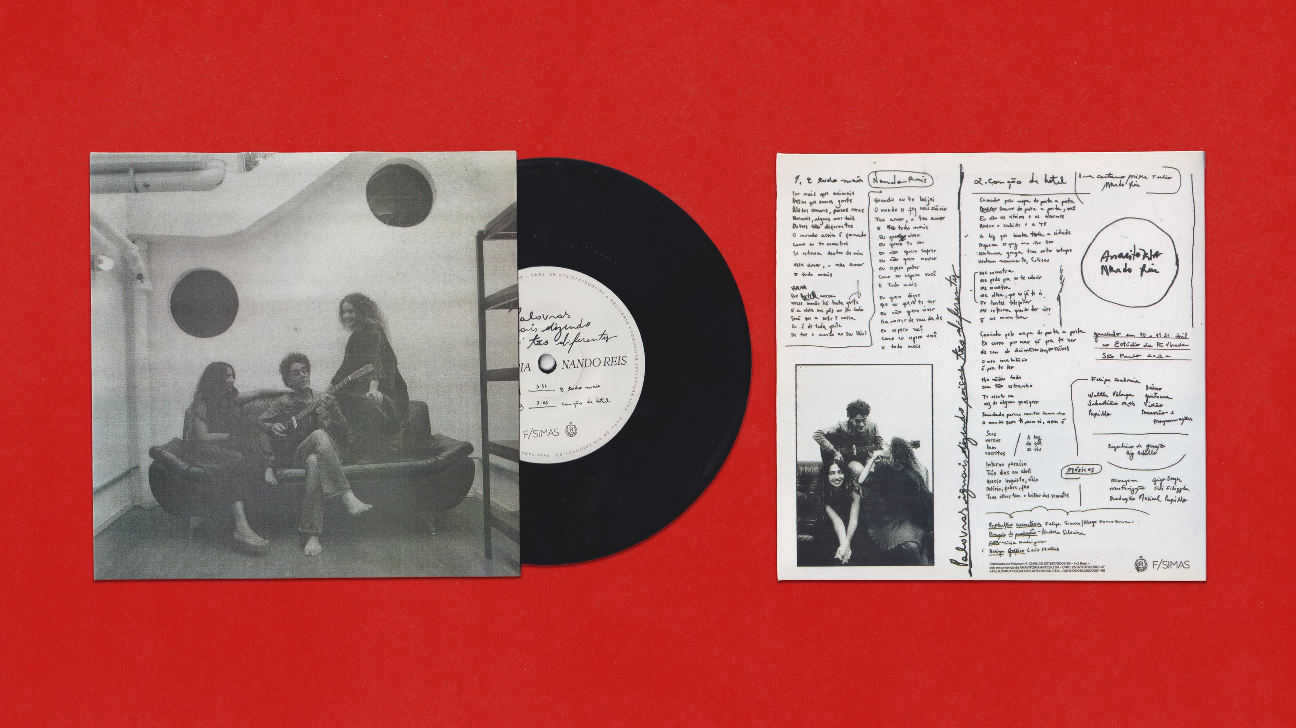 The seven-inch record with its sleeve and handwritten lyric insert on red